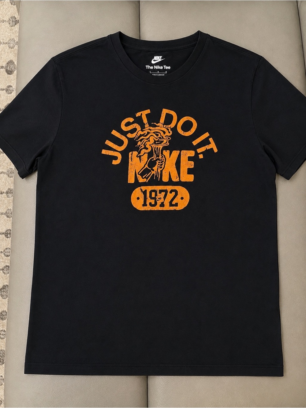 Nike Black Short Sleeve Tee with Orange 'Just Do It' Graphic